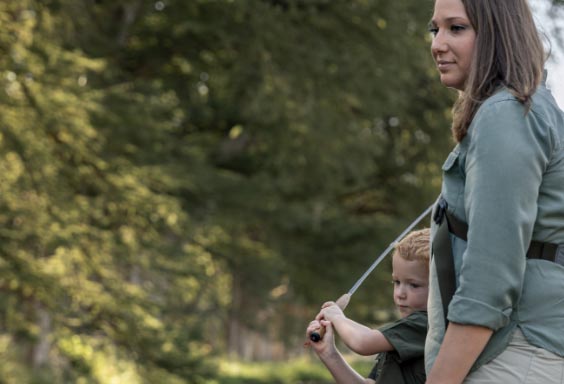 Woman and son fishing
